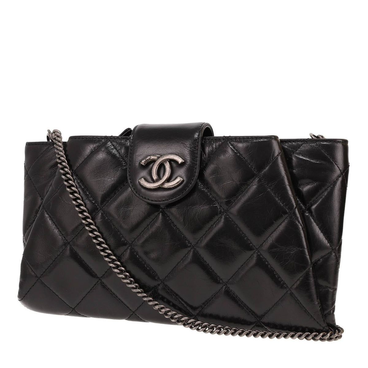 Chanel clutch bag in black distressed leather