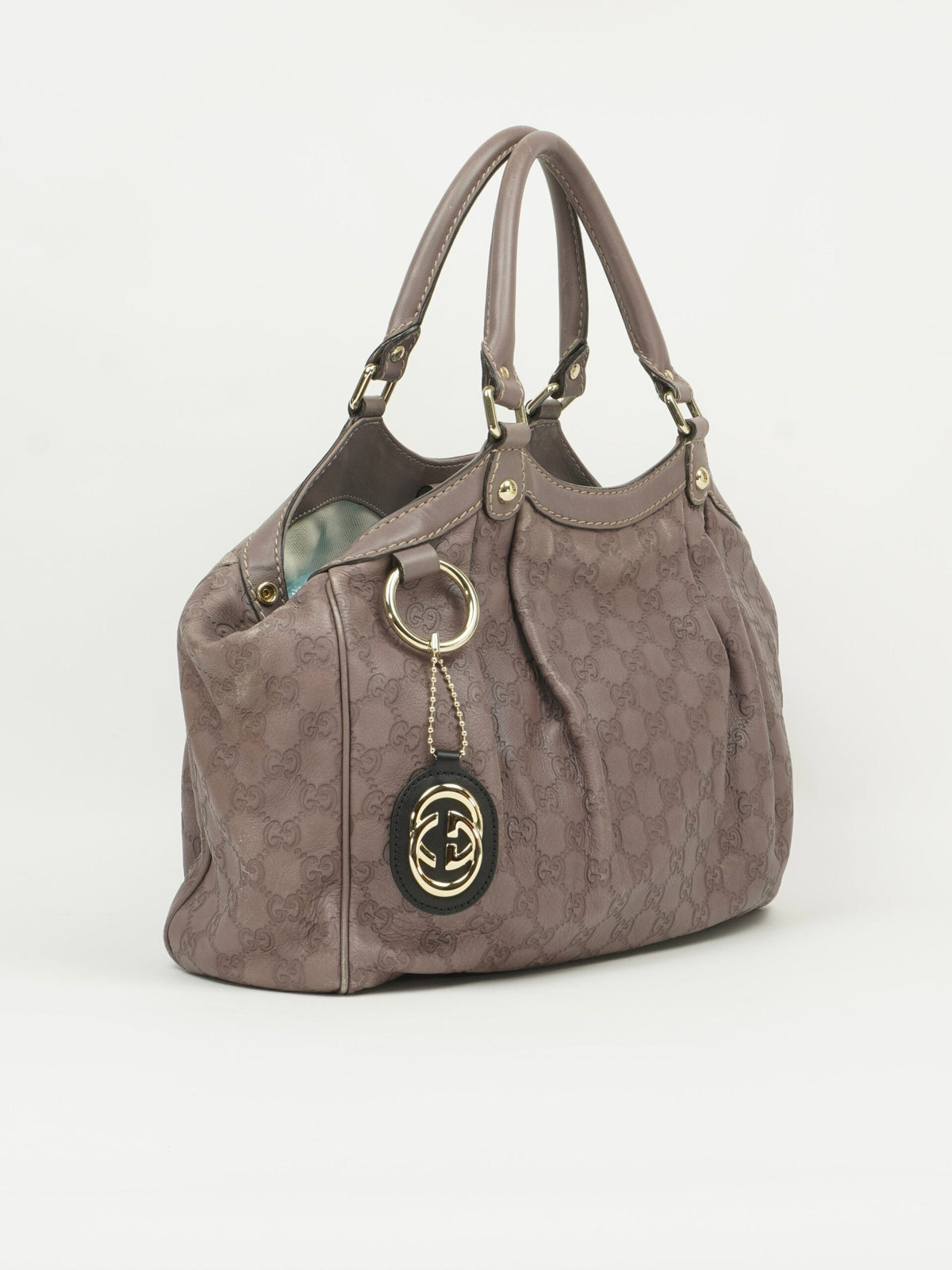 GUCCI MONOGRAM LEATHER SUKEY BAG