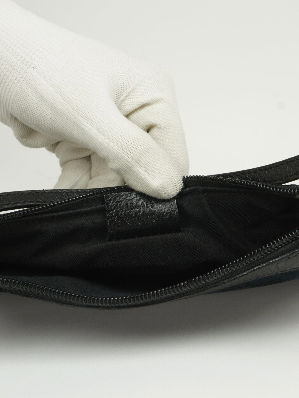 GUCCI MONOGRAM BOOT CHARM BAG