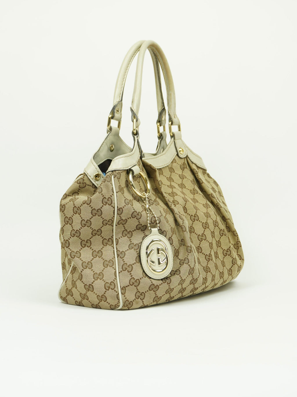 GUCCI MONOGRAM SUKEY BAG