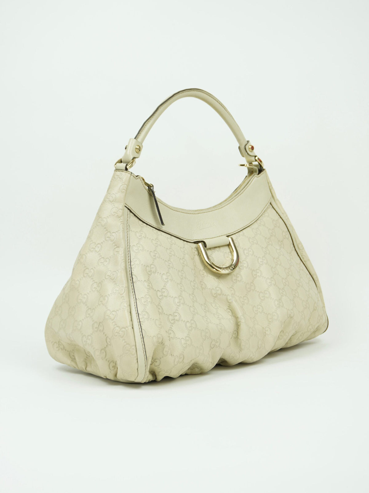 GUCCI LEATHER EMBOSSED MONOGRAM ABBEY BAG