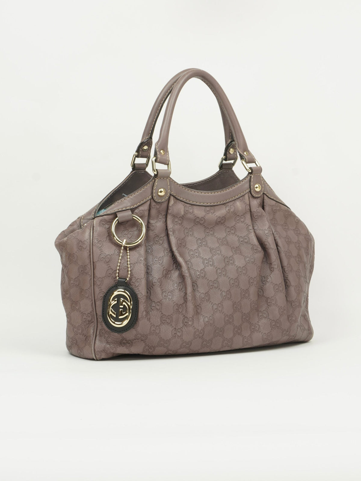 GUCCI MONOGRAM LEATHER SUKEY BAG